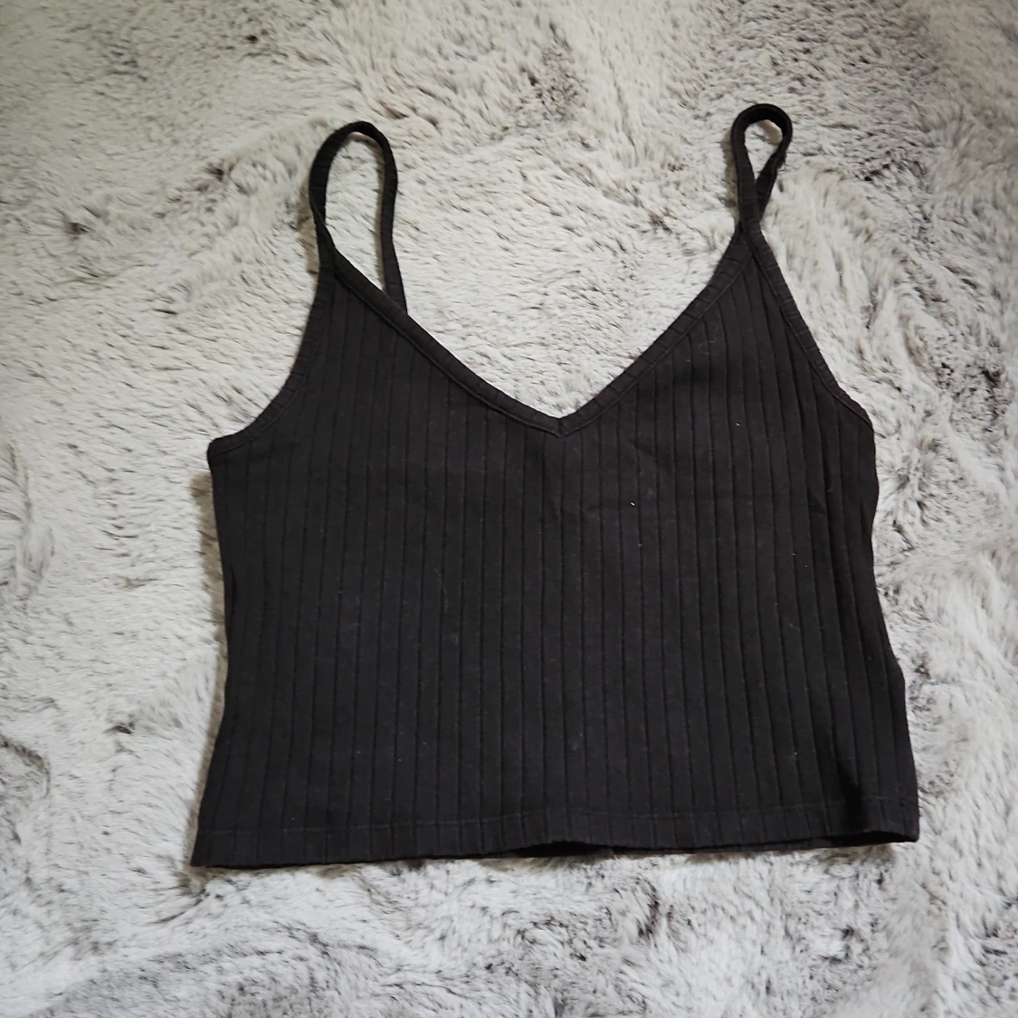 Svart ribbad linnetopp