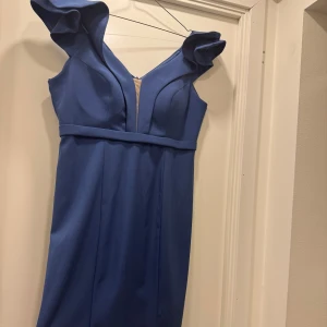 Klänning  - Klänningens skick är mycket bra 