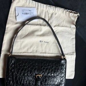 Catch***BY FAR Miranda shoulder bag New - Miranda' crocodile print leather shoulder bag with flap and buckle closure, gold hardware.  Color: Black Composition: 100% cow leather Size & Fit: Depth	3 cm Handle	17 cm Height	15 cm Width	26 cm - user only two times for special occasions! 