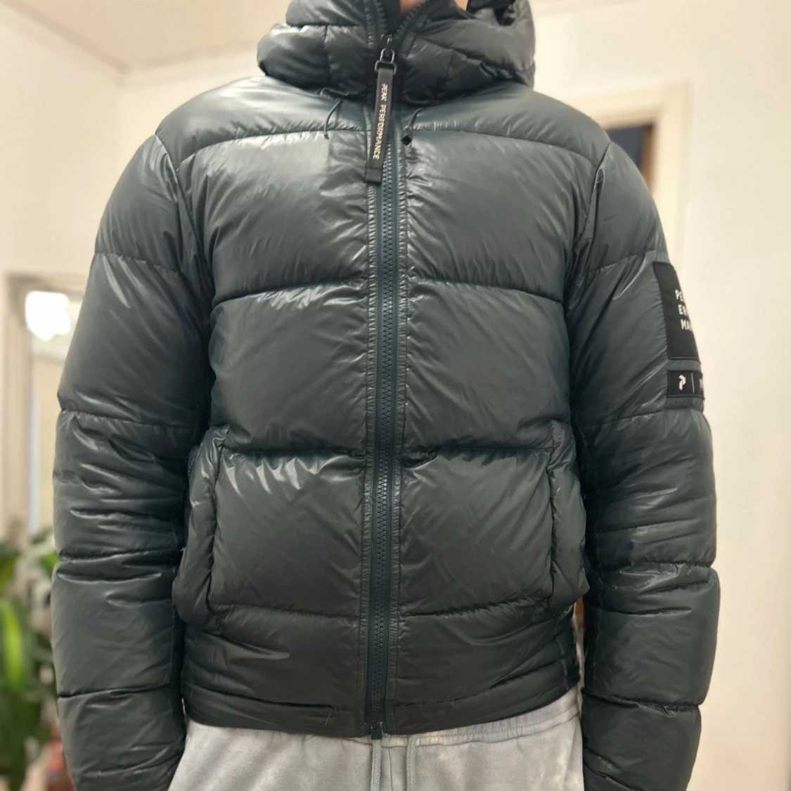 Grön pufferjacka från Peak Performance - 91