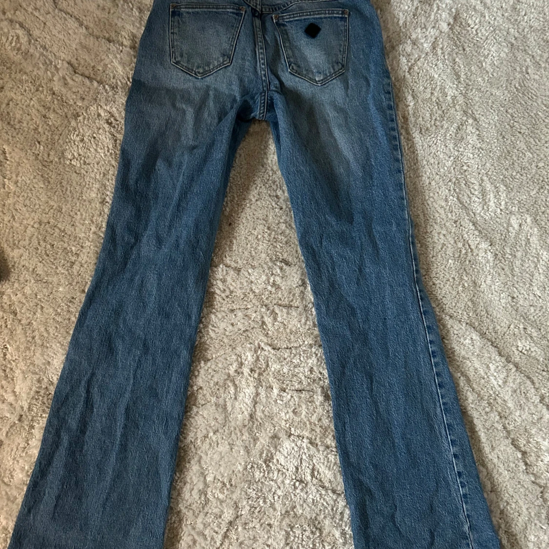 Lågmidjade jeans med bootcut - 1