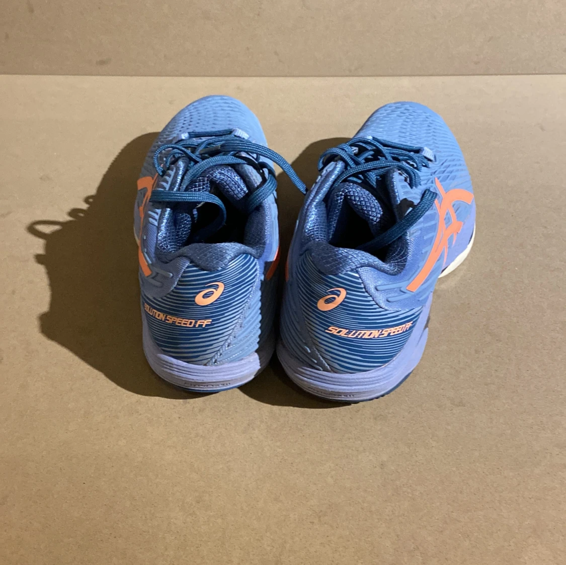 Blå och orange Asics Solution Speed FF - 91