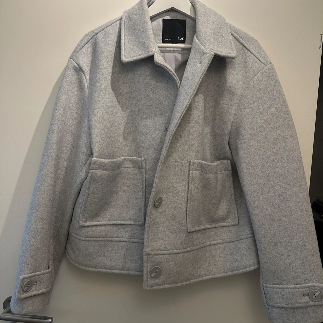 Grå kappa från 157
