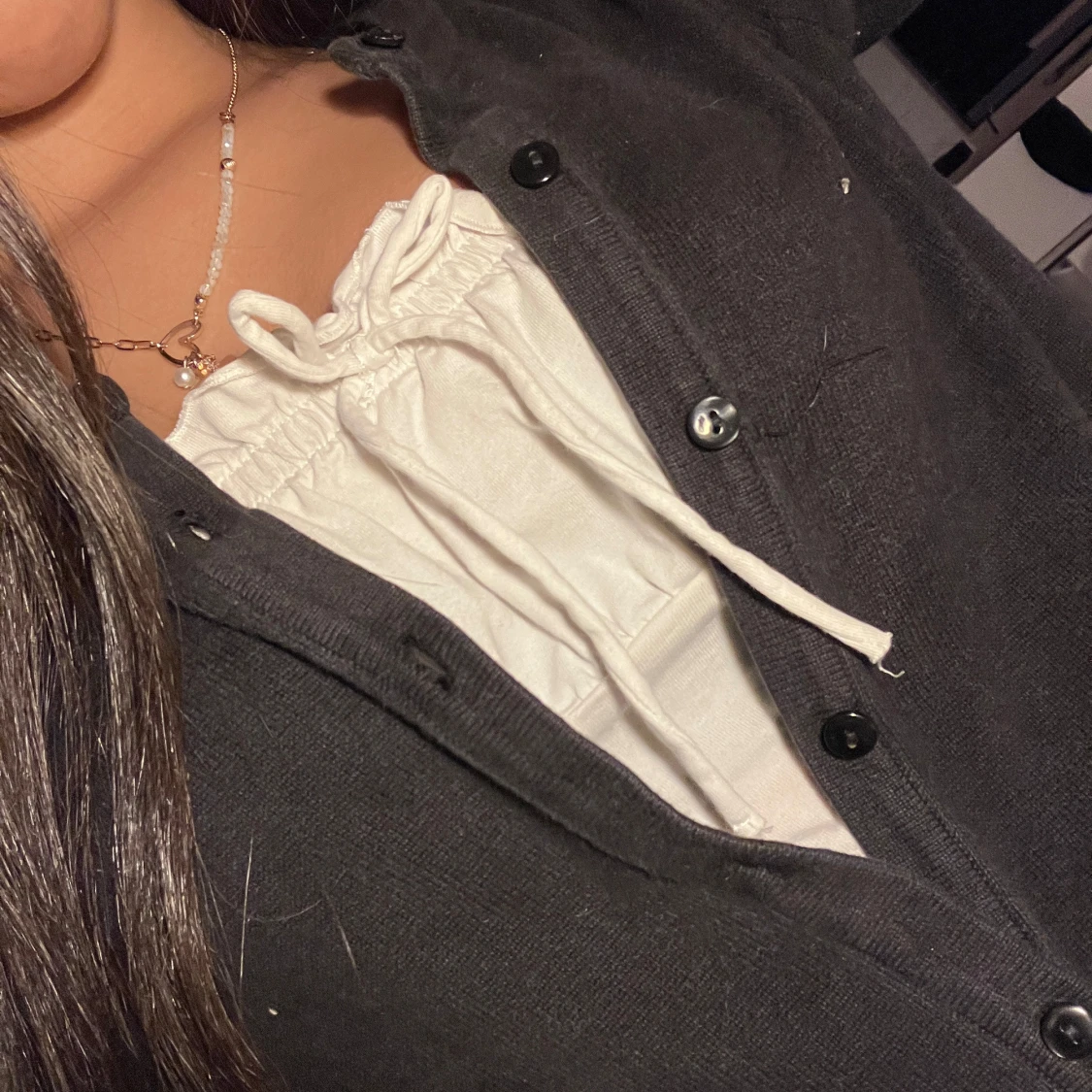 Svart kofta med knappar - 93