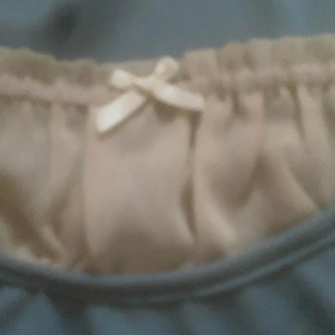 Blå långärmad topp med rosett - 92