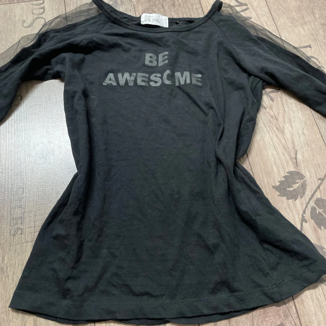 Svart topp med text från D6 Soul