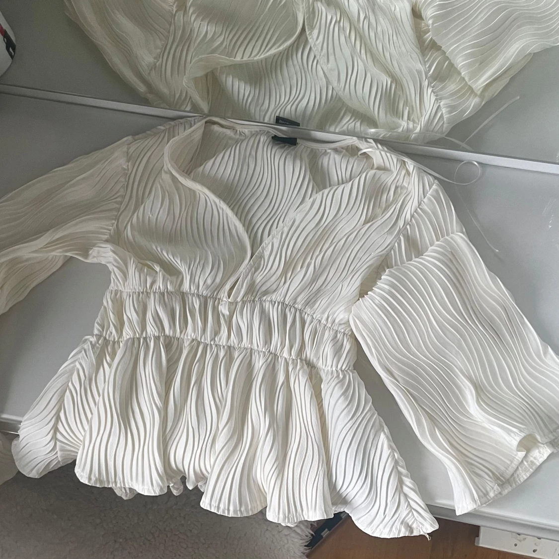 Vit blus från Gina Tricot