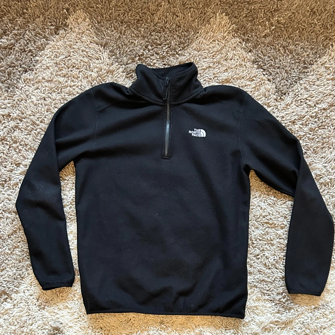 Svart fleece half zip-up, The North Face