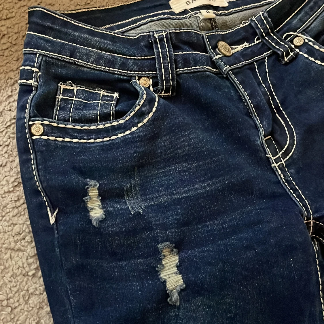 Mörkblå lowaist bootcut jeans från Bamboo - 93