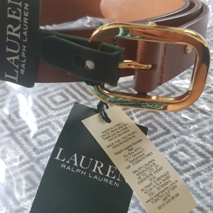 Bälte  - Jag säljer ett helt nytt och aldrig använd bälte Ralp laurens,  Storlek L 105CM  passar bra till byxor och jeans,,, Hör gärna av dig vid intresse     