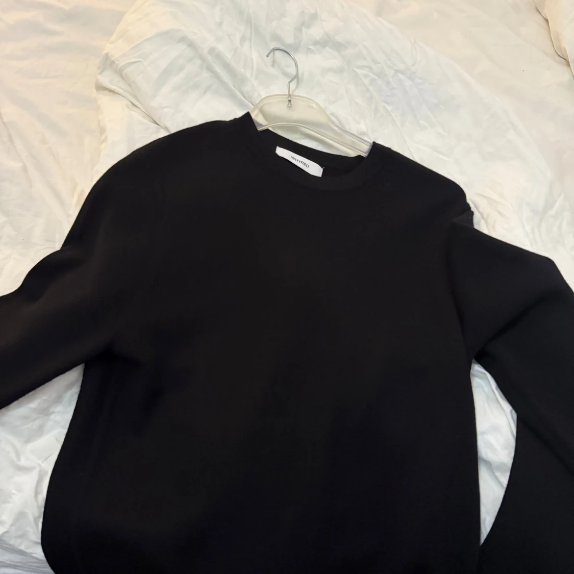 Svart tröja med knappar