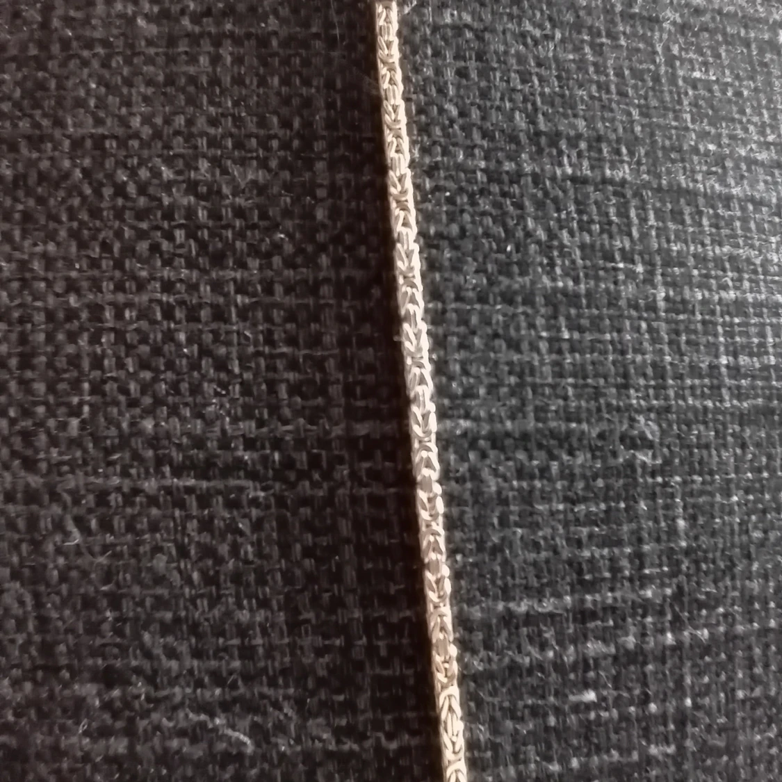 Flätat silverarmband - 91