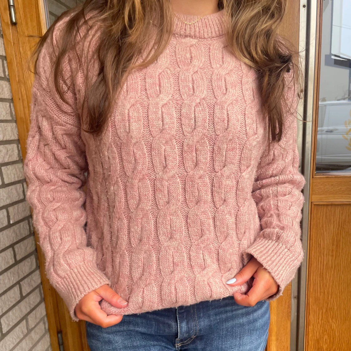 Rosa stickad tröja
