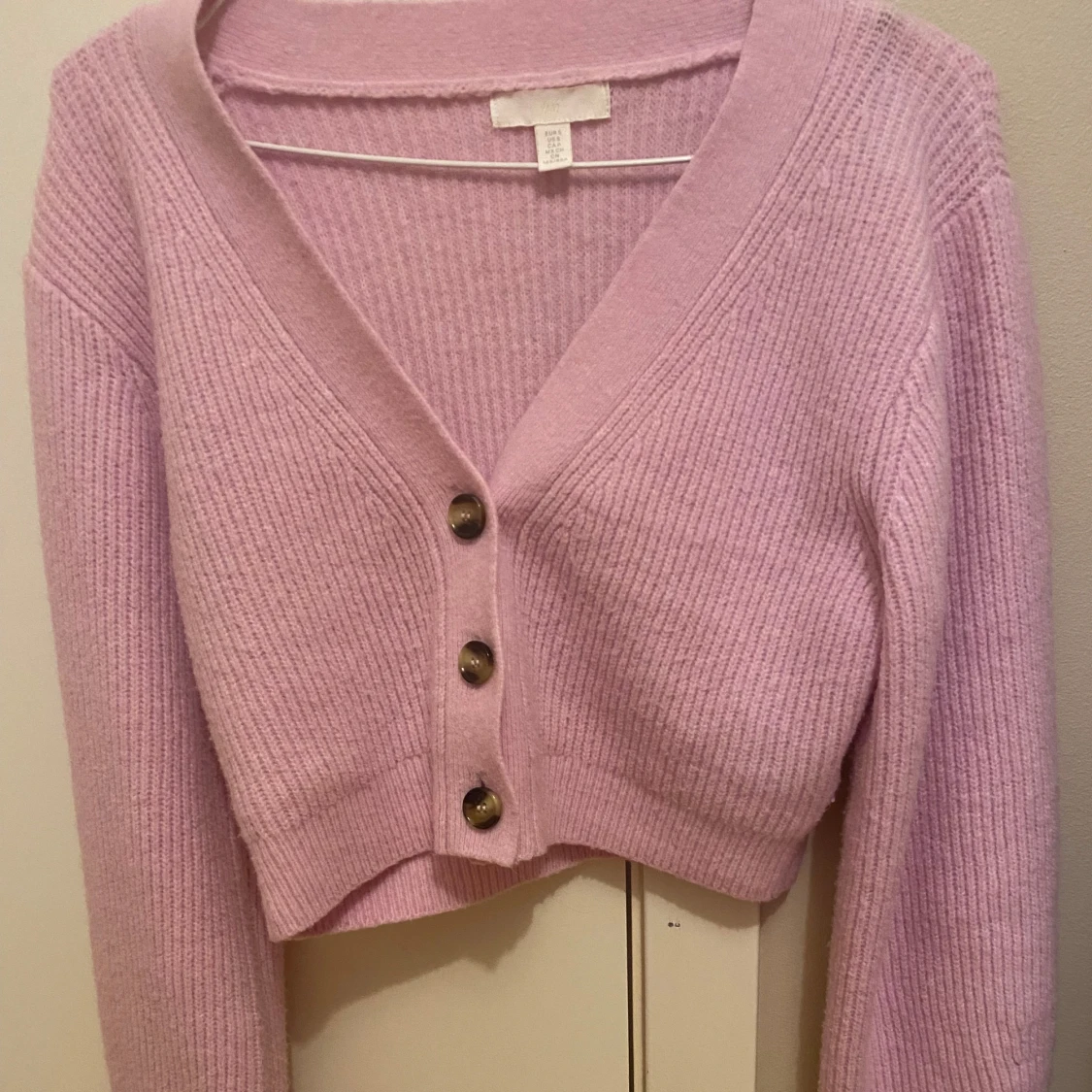 Ljusrosa ribbad kofta från H&M - 1