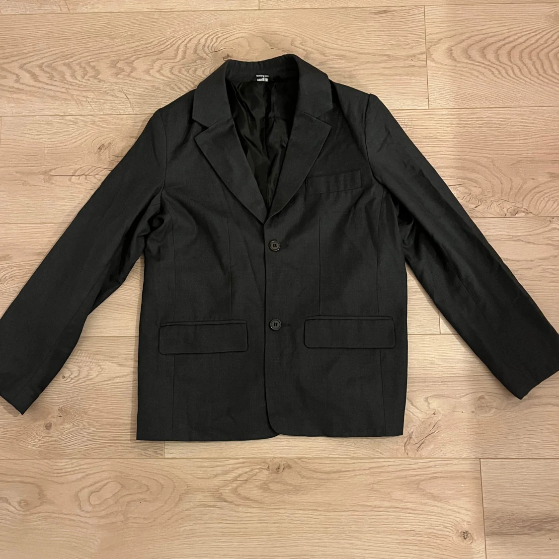 Svart kavaj och byxor