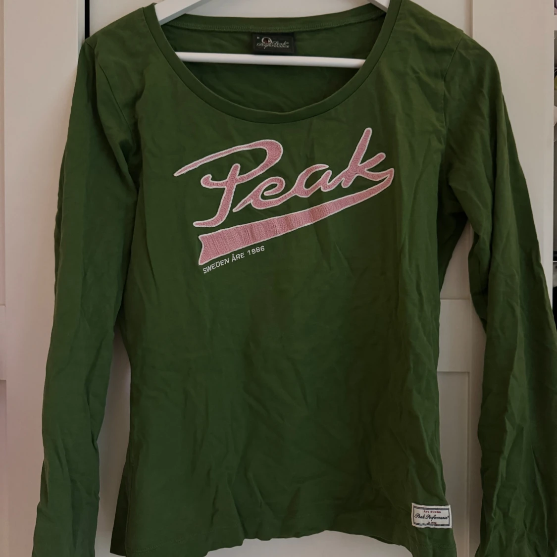 Grön långärmad tröja från Peak Performance