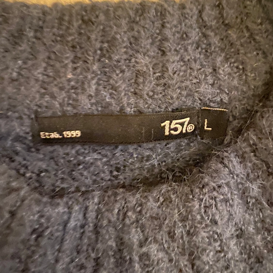 Mörkblå stickad tröja från 157 - 92