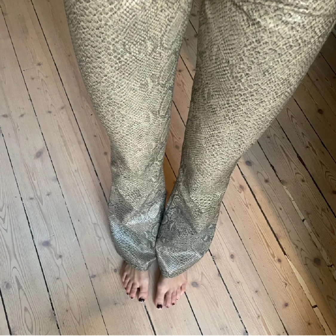 Mönstrade bootcut byxor - 90