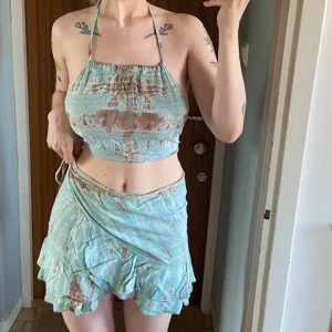 Topp+kjol - Asså sååå fint set men jag använder det inte :( endast provat. Står ingen storlek men skulle säga att det passar mellan XS-M pga justerbart.