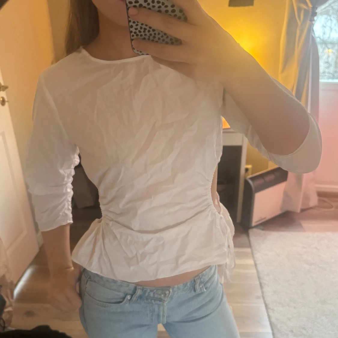 Vit topp med knytning i sidan - 90