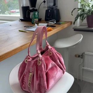 rosa juicy väska - Köpt här på plick och oanvänd av mig, org pris 3500kr, nyskick