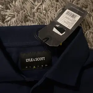 Piké från lyle scott aldrig använd med prislapp