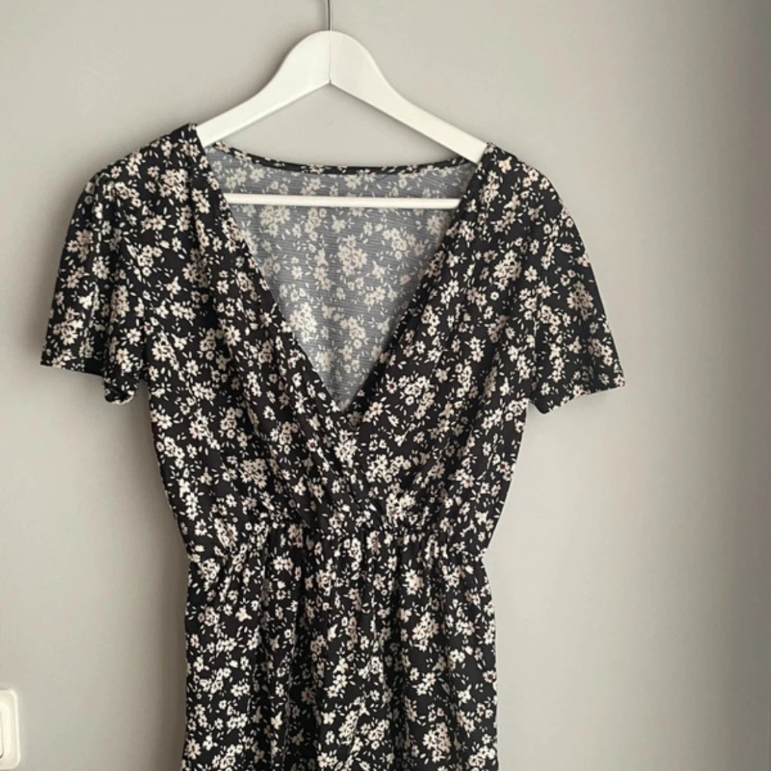 Svart blommig jumpsuit