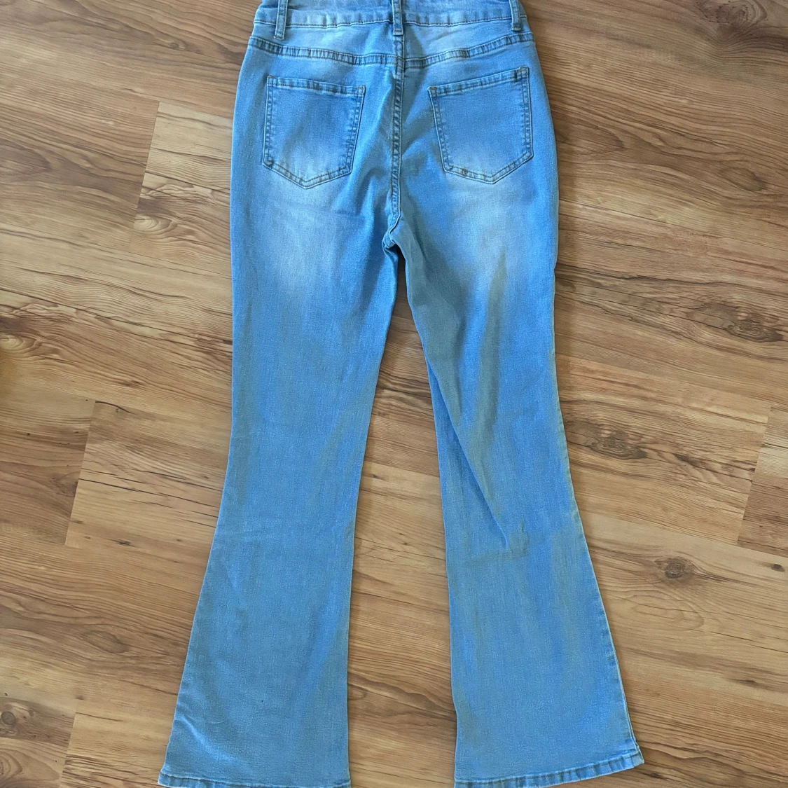 Ljusblå bootcut jeans - 92