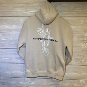 Beige huvtröja  - Beige hoddie, är som ny, aldrig använd. 