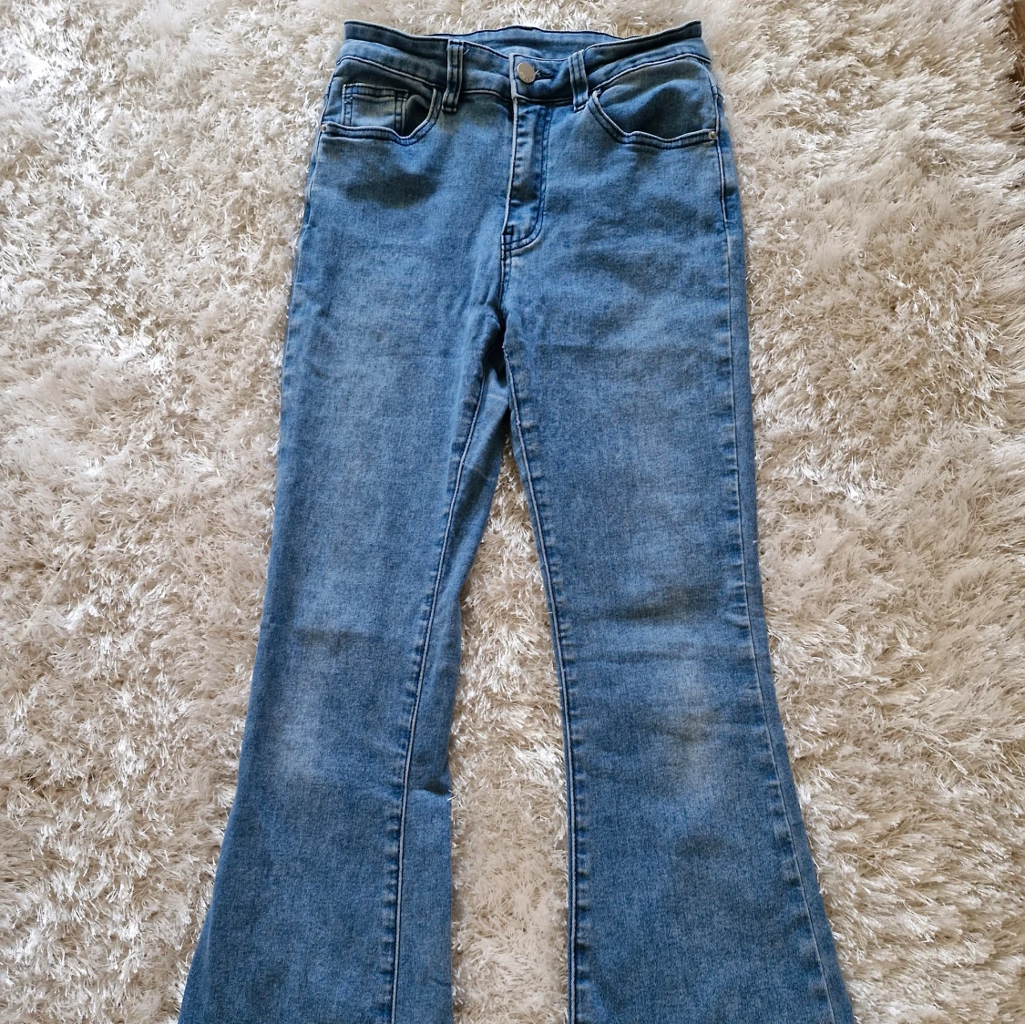 Utsvängda jeans XS - 90