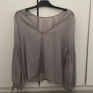 Glitter blus  - Aldrig använd då jag inte haft något tillfälle men är vi bra skick 