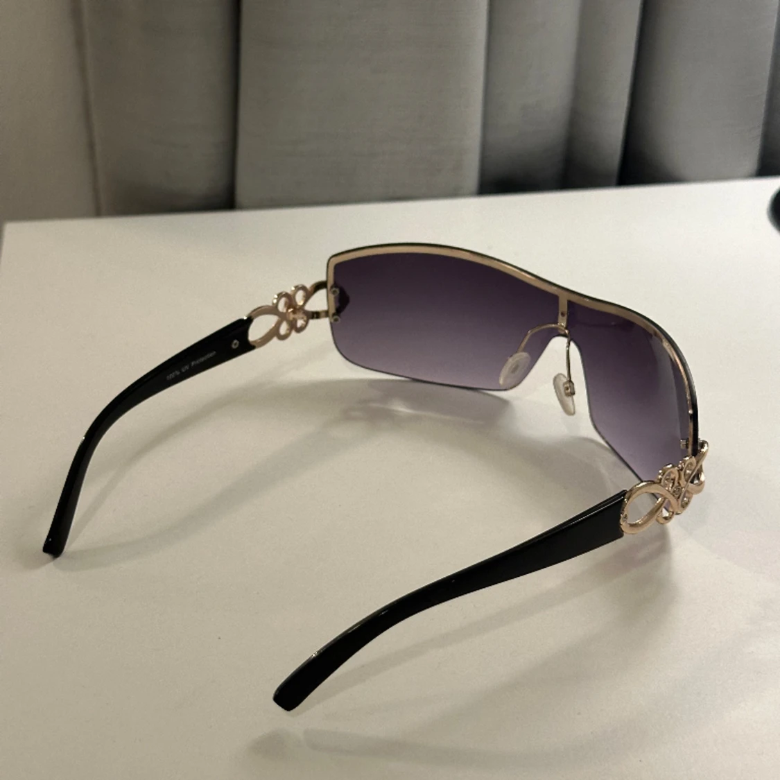 Solglasögon från Nelly - 90