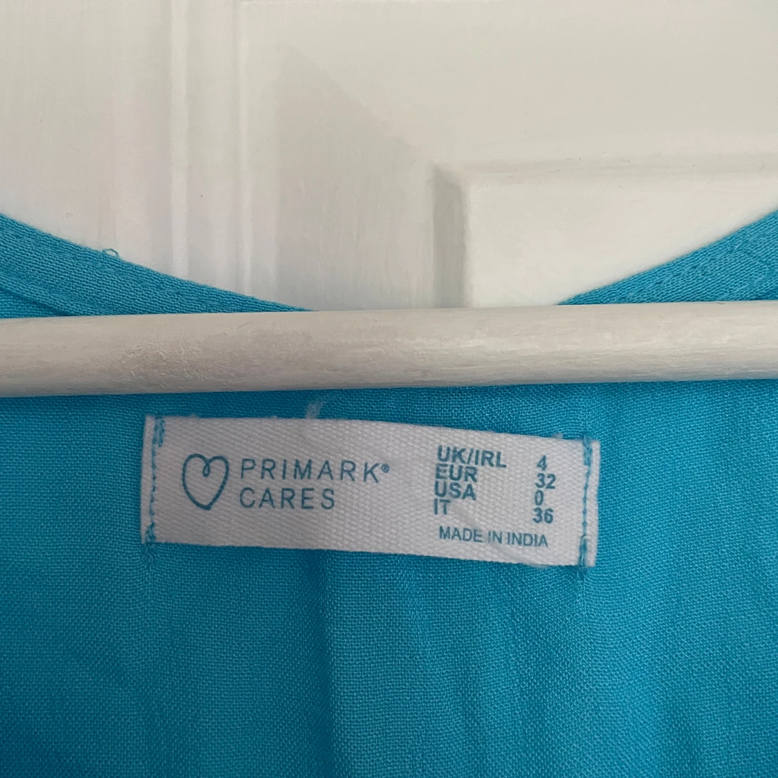 Blå v-ringad klänning - 91