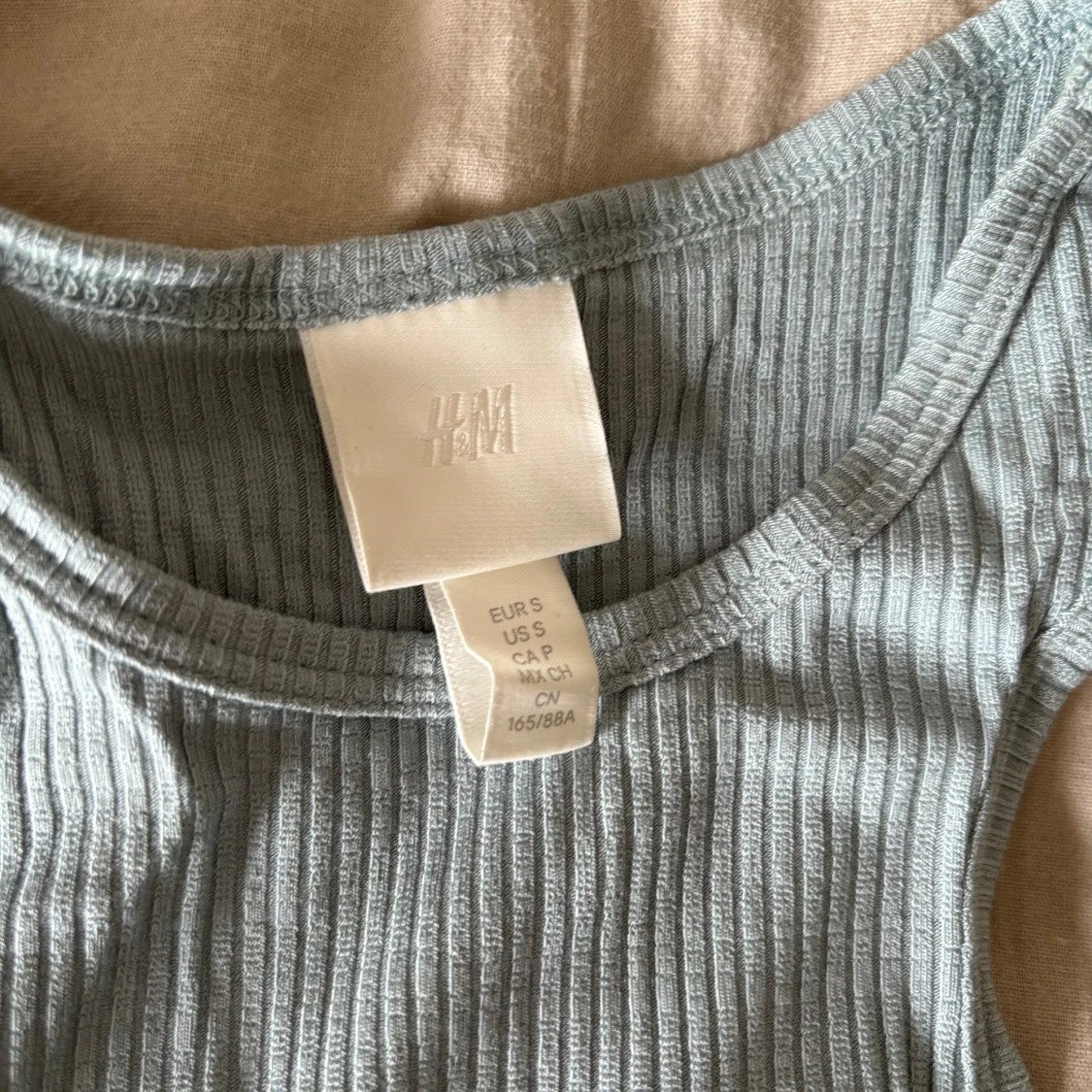 Ljusblå ribbad linnetopp från H&M - 90