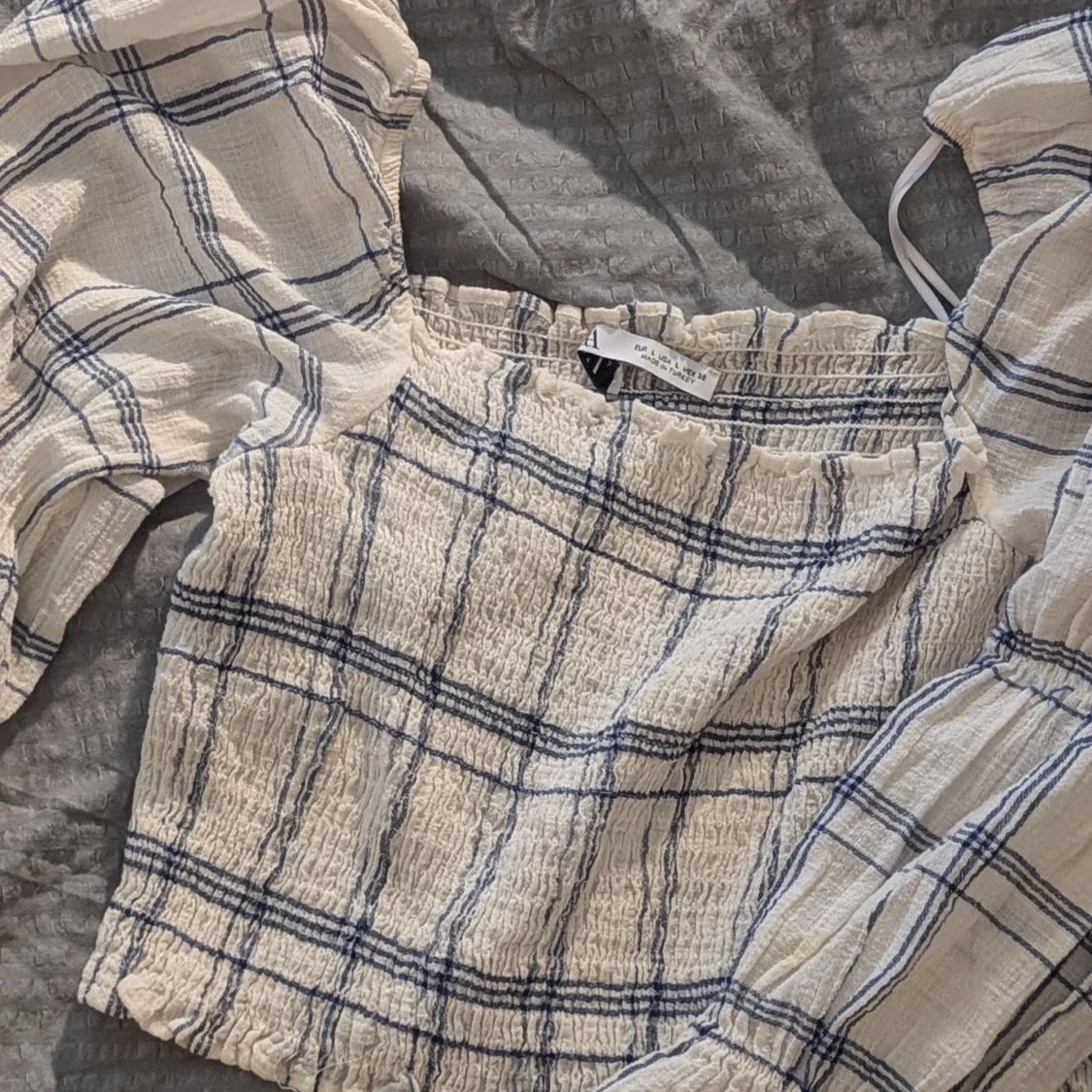 Rutig blus med långa ärmar - 92