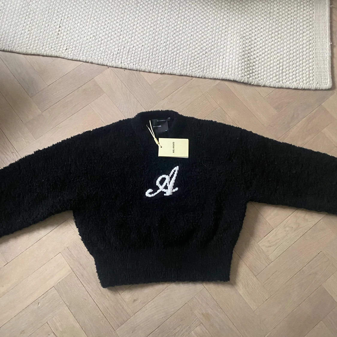 Axel Arigato Roots Sweater Svart
