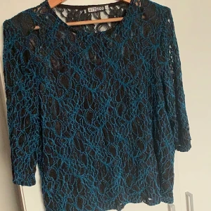 Blå/svart topp - Bra skick, använd några gånger