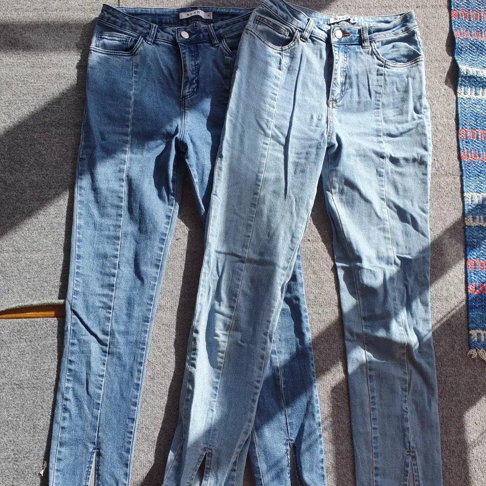 2 par jeans med slits fram. Från nakd, strl 36. Jeans & Byxor.