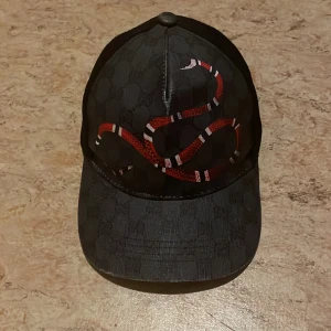 Gucci keps  - Gucci snake keps, oanvänd. Malmö eller fraktar 