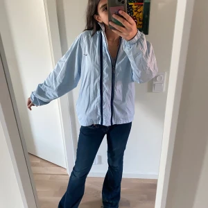 Regn jacka - En as snygg regn jacka från nike!!