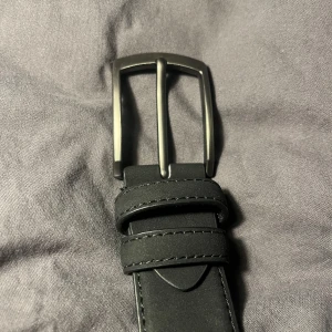 Mocha bälte - Stilrent mocha bälte aldrig använt!!