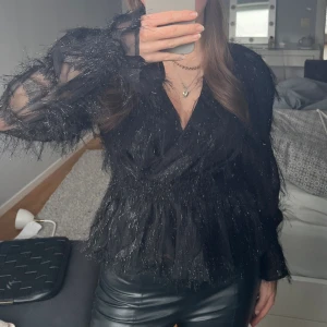 Blus - Fin blus som endast är använd en gång.