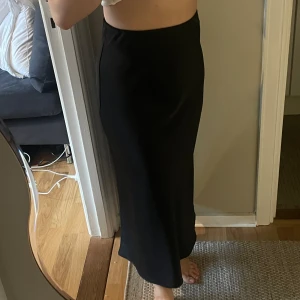 Silky skirt - Silky skirt in great condition.  Stretchy waistband so could fit M. 