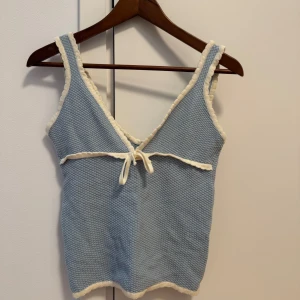 Djerf Avenue Amorini Tank baby blue  - worn once. the label got unstitched but easily fixable. Selling as I don’t wear often 