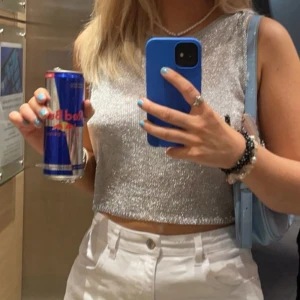 Silvrig glittrig topp - Endast använd en gång