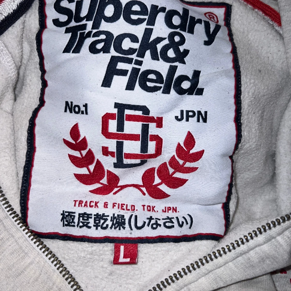 Vit/ljugrå melerad hoodie. - 90