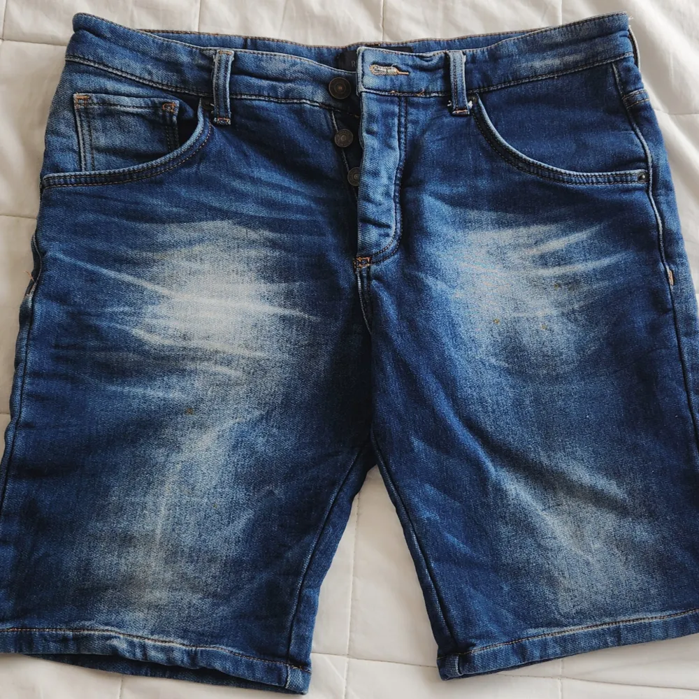 Denim stonewashed faded. Shorts.