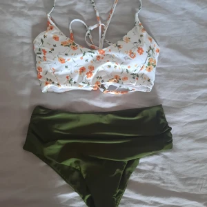 Nya kläder - Oanvänd tunn blommig klänning, strl L, 100 kr Oanvänd lång militärtgrön kjol, strl liten L, 100 kr Oanvänd bikini strl L 100 kr