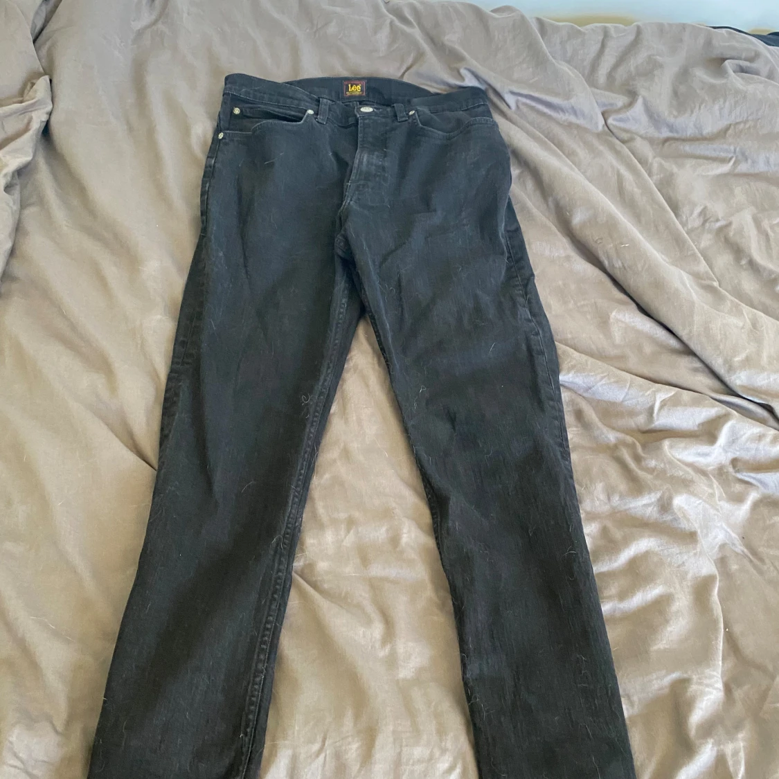 Svarta Lee jeans  - 90