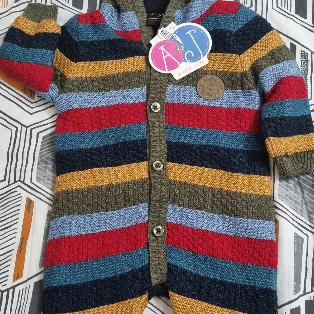 Multi woolen overall  Size 68 New with tag . Övrigt.